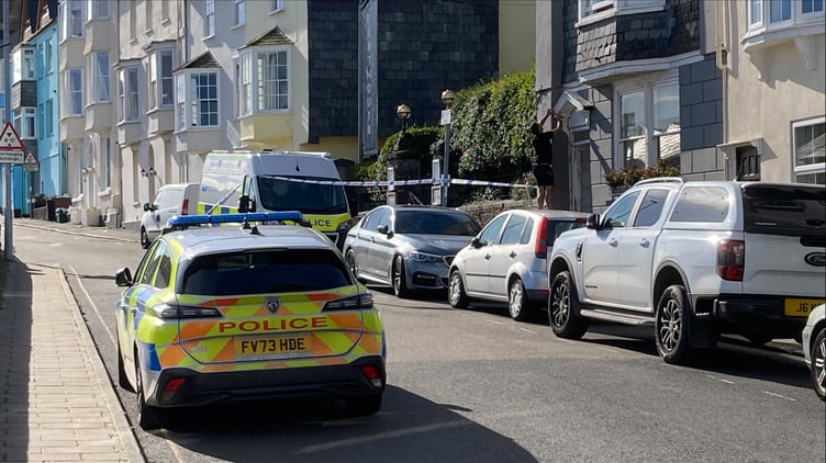 Police in attendance at Newcomen Road.